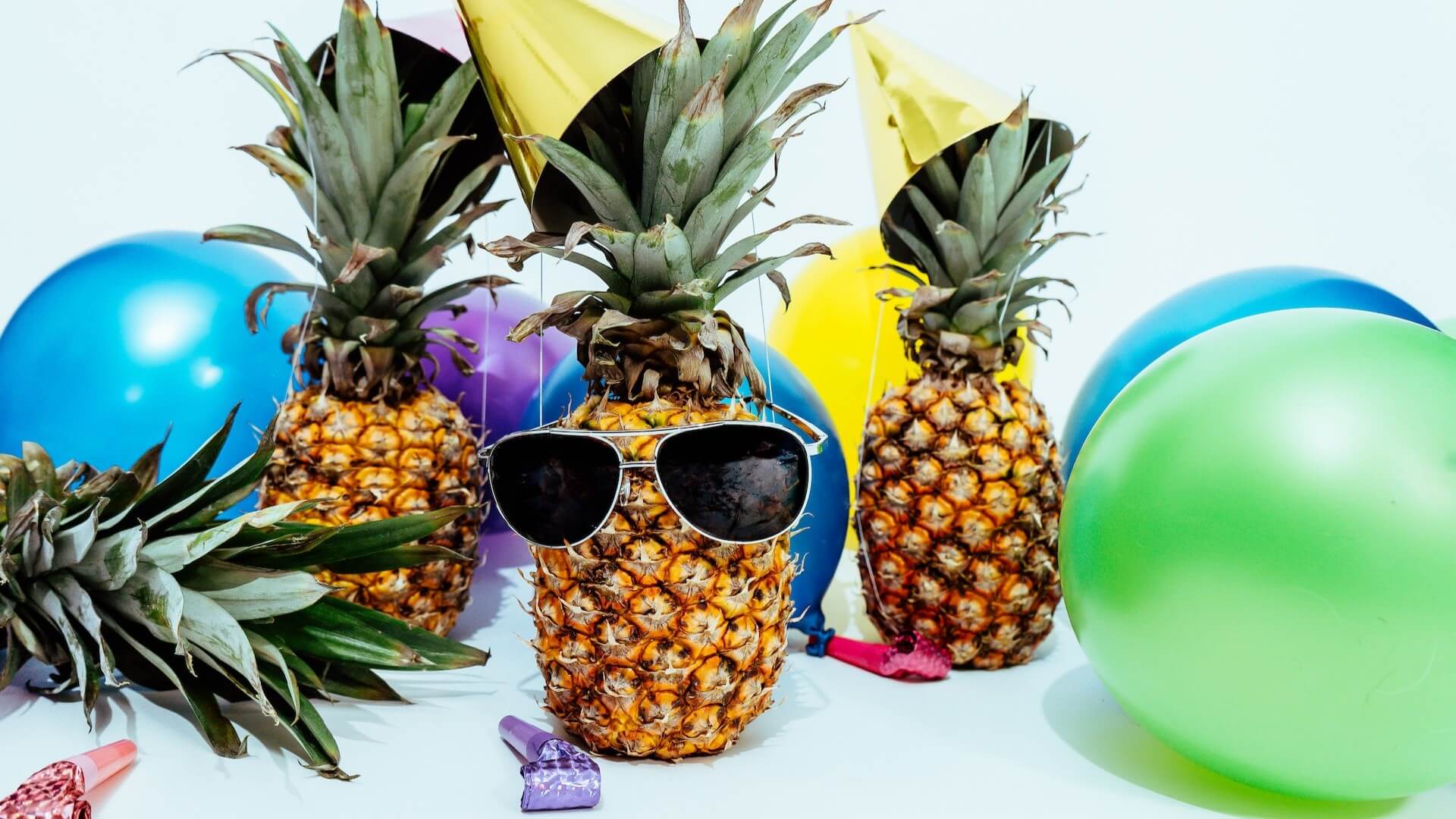 Tropical-themed party with pineapple decorations.